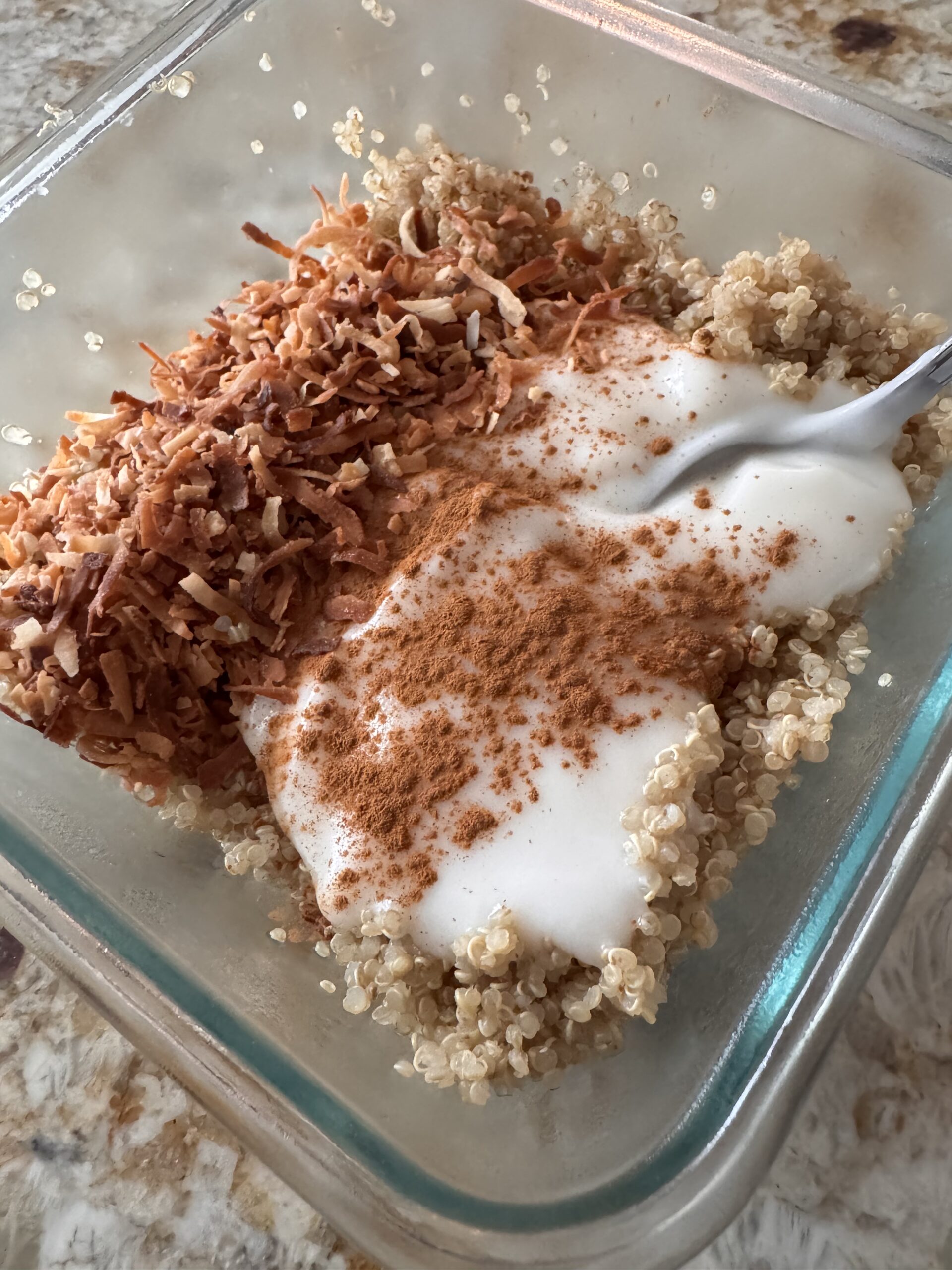 Quinoa, coconut and yogurt. A healthy breakfast.